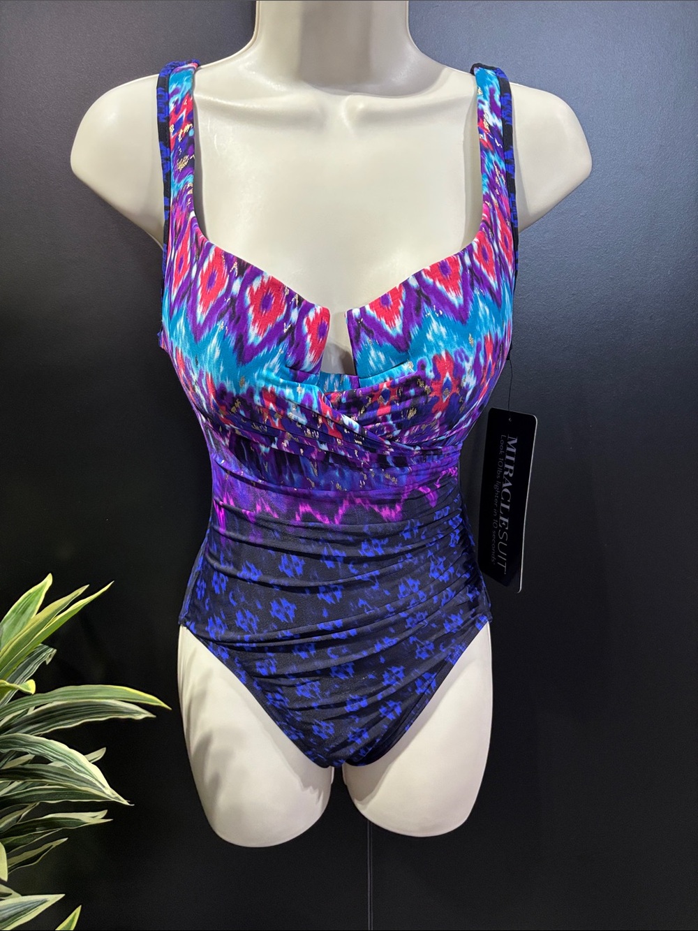 Miraclesuit V-neck,scoop back,padded underwire,ruched bodice,slimming